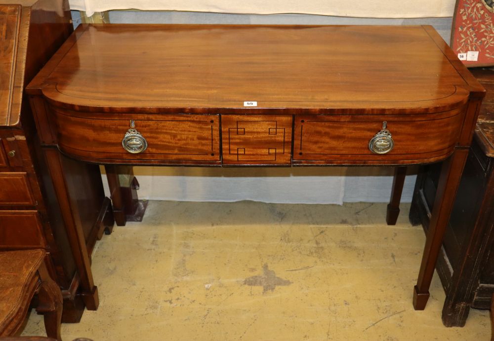 A Regency mahogany and ebony line inlaid three drawer bow fronted serving table, W.117cm